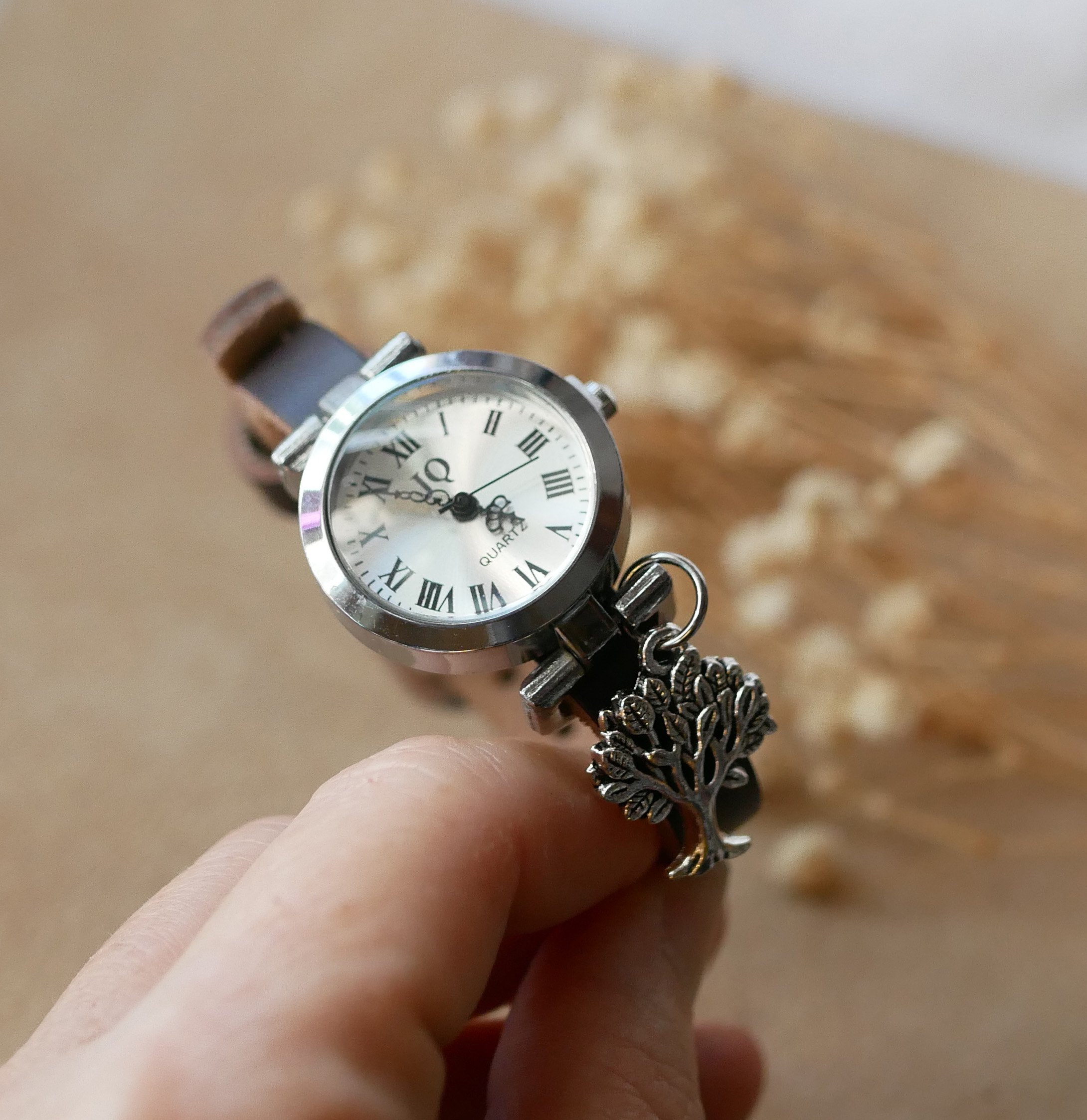 Montre argent au bracelet cuir avec boucle argenté