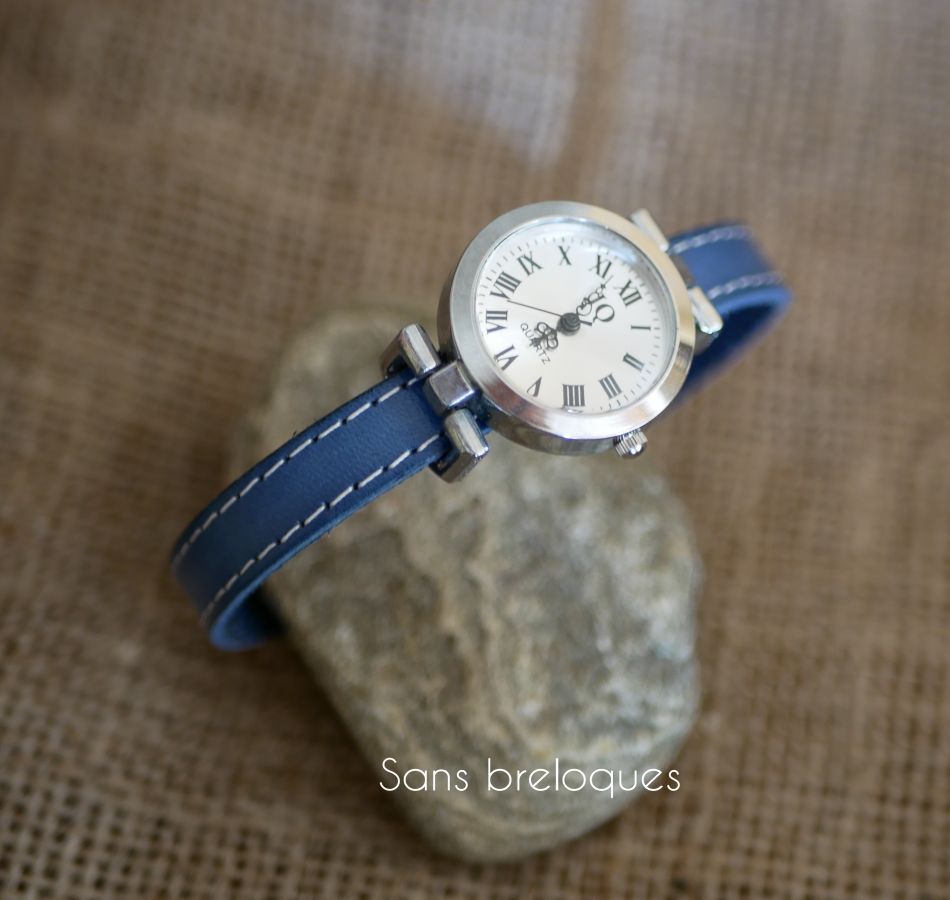 Montre bracelet cuir bleu surpîqûres blanches