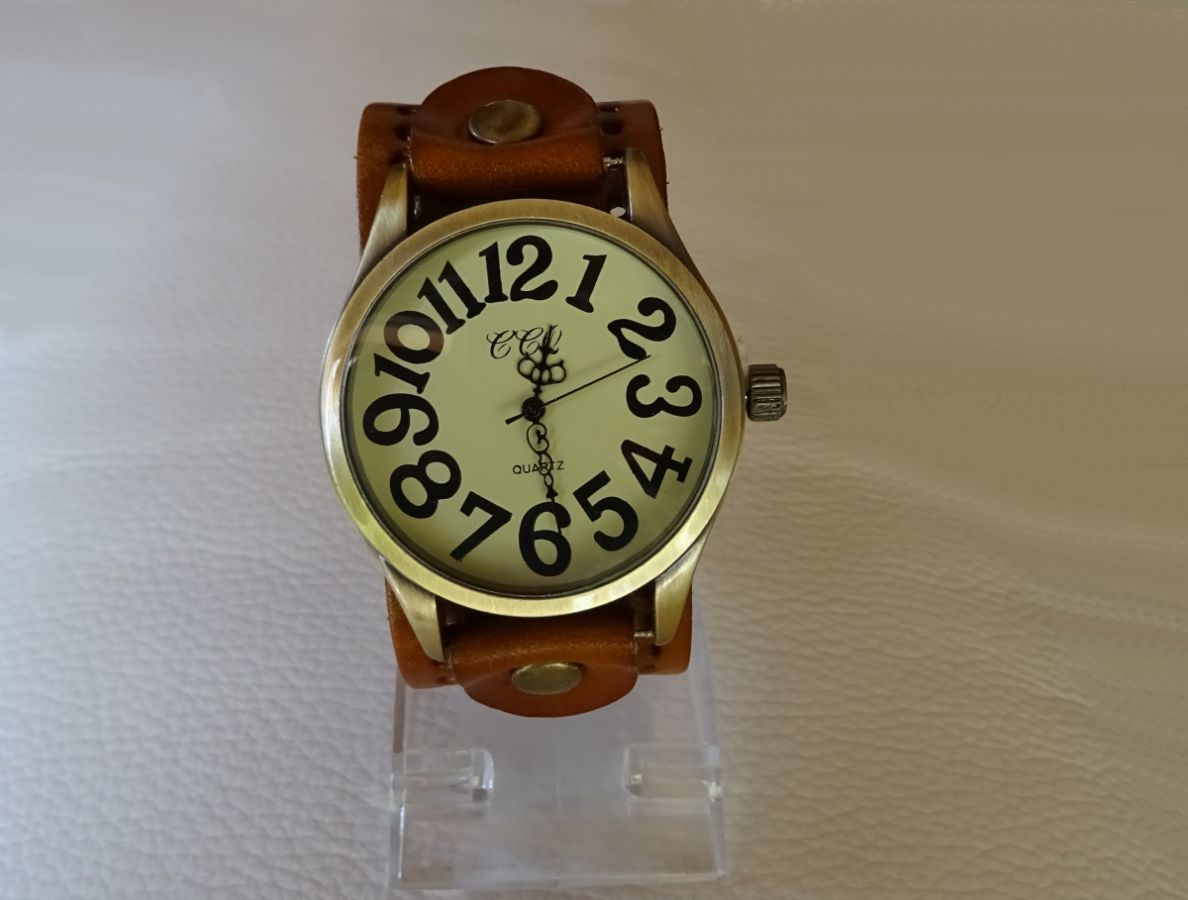 Montre homme ou femme gros cadran cuir vintage