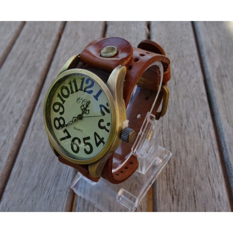 Montre homme ou femme gros cadran cuir vintage